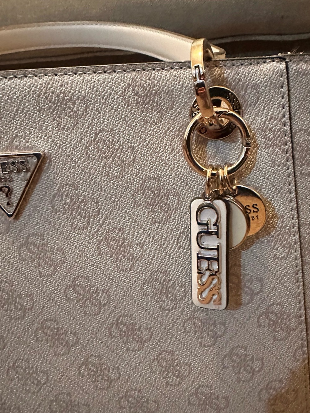 GUESS White and Gold Logo Tag Key Charm